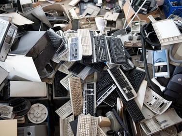 pile of various office electronic waste