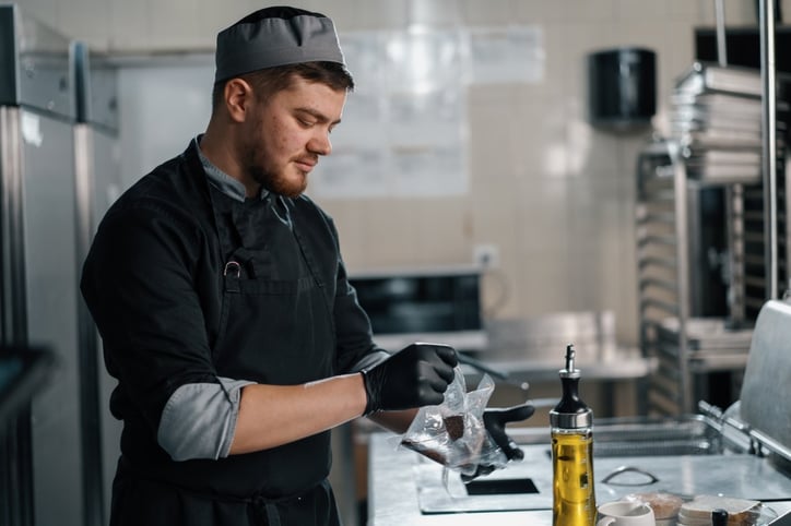 Chef in a hotel restaurant kitchen.