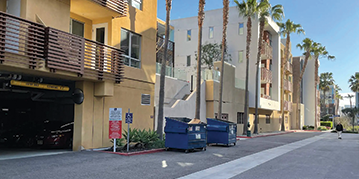 RoadRuFront Load Dumpsters at Apartment Complexnner-MPK-Front-Load-Dumpster-at-Apartment-Complex